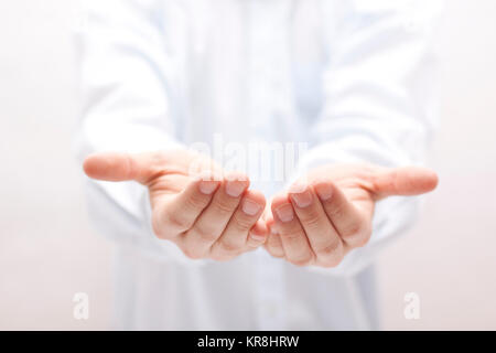 Open hands. Holding, giving, showing concept. Stock Photo