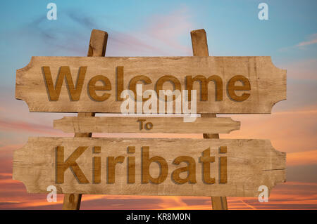 welcome to kiribati sign on wood background Stock Photo