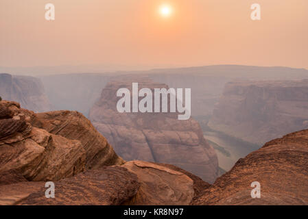 Afternoon Haze Over Horseshoe Bend in late summer afternoon Stock Photo