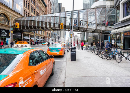 Pedway, elevated pedestrian walkway linking Toronto Eaton Centre shopping center and Saks Fifth Avenue Toronto store on Queen Street West, Toronto. Stock Photo