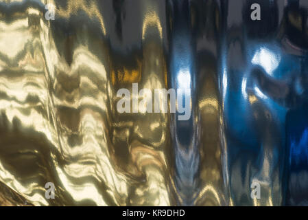 multicolored color folded metallic foil abstract bacgkground Stock Photo