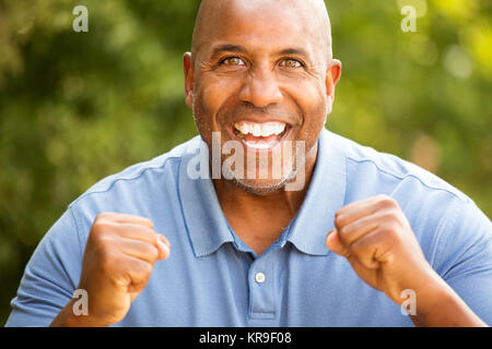 African American man pumping his fist. Stock Photo