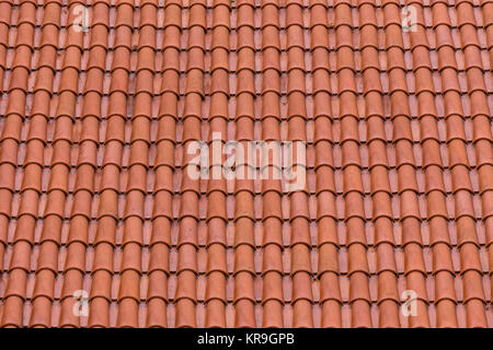 Closeup of the red clay roof tiles Stock Photo