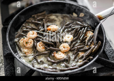 Frying shrimps Stock Photo