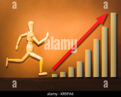 The wooden figure running on stairs of business plan Stock Photo