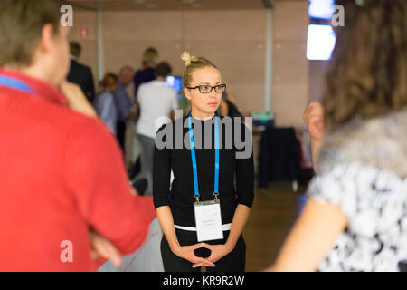 People interacting during coffee break at medical conference. Stock Photo