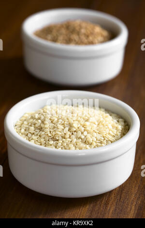 White and Roasted Sesame Seeds Stock Photo