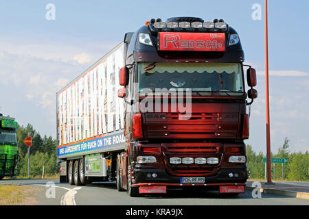 White DAF XF 105.460 semi trailer driving on cobbled Helsinki street after  arrival in Port of Helsinki, Finland on sunny day of spring. April 7, 2020  Stock Photo - Alamy