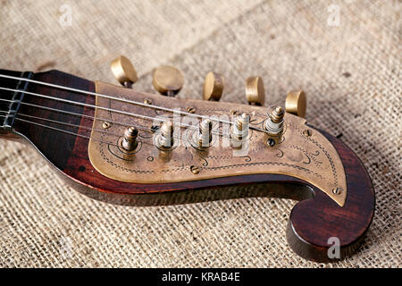 detail old musical instrument tamburitza background Stock Photo