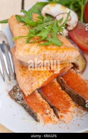 grilled samon filet with vegetables salad Stock Photo