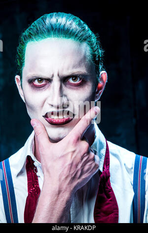 Bloody Halloween theme: crazy joker face Stock Photo