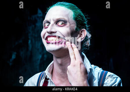 Bloody Halloween theme: crazy joker face Stock Photo