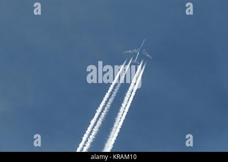 Plane at cruising altitude Stock Photo