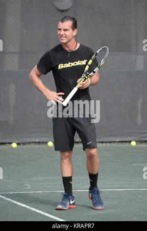 BOCA RATON, FL - NOVEMBER 20: Gavin Rossdale playing Tennis at The Boca Raton Resort Tennis Center for the 26th Annual Chris Evert/Raymond James Pro-Celebrity Tennis Classic, Boca Raton, Florida.   People:  Gavin Rossdale Stock Photo