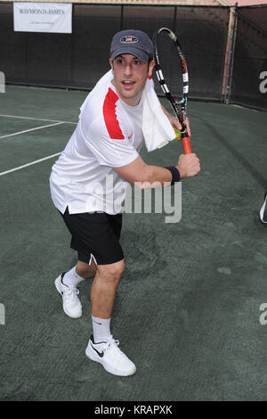 BOCA RATON, FL - NOVEMBER 20: Jason Biggs playing Tennis at The Boca Raton Resort Tennis Center for the 26th Annual Chris Evert/Raymond James Pro-Celebrity Tennis Classic, Boca Raton, Florida.   People:  Jason Biggs Stock Photo