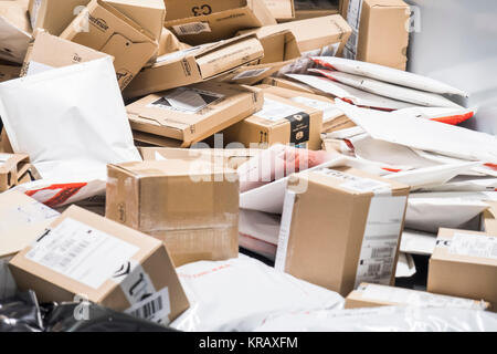 BERLIN / GERMANY - DECEMBER 19 2017 : The amount of parcels is increasing very much five days before christmas Stock Photo