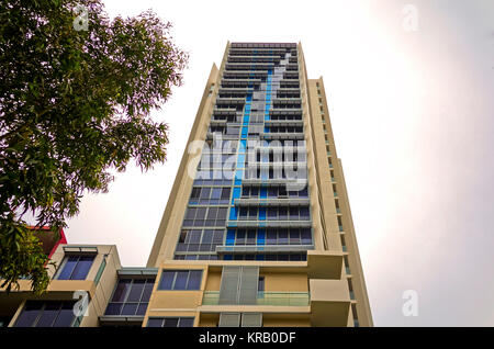 Tall Office building at Rhodes, Sydney, Australia. Commercial suites in a new apartment block. Looking up at a modern high-rise apartment house. Moder Stock Photo