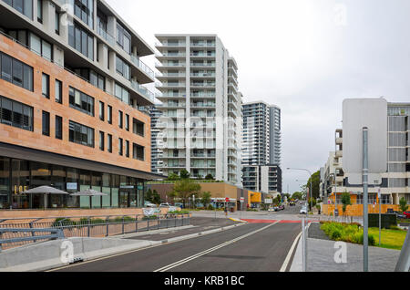RHODES, SYDNEY, NEW SOUTH WALES, AUSTRALIA, 15 DECEMBER 2017: Residential area in the modern suburb of Rhodes with shops, restaurants and high-rise ap Stock Photo