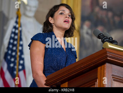 Grammy Award winning singer/songwriter Norah Jones sings 'America The Beautiful'  during a Congressional Gold Medal Ceremony honoring Apollo 11 astronauts Neil Armstrong, Buzz Aldrin and Michael Collins along with John Glenn, the first American to orbit the Earth, in the Rotunda at the U.S. Capitol, Wednesday, Nov. 16, 2011, in Washington. The Congressional Gold Medal is an award bestowed by Congress and is, along with the Presidential Medal of Freedom the highest civilian award in the United States. The decoration is awarded to an individual who performs an outstanding deed or act of service  Stock Photo