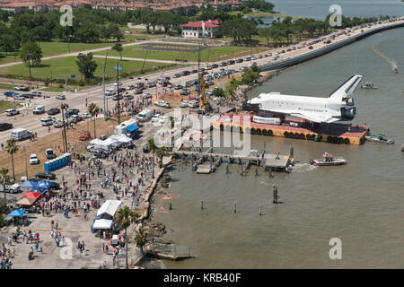 Date: 06-01-12 Location: Galveston Bay, Kehmah and Clear Lake Subject: Space shuttle Mockup 'Explorer' arriving by barge in transport to Space Center Houston Photographer: Regan Geeseman Space Shuttle Explorer at JSC dock in Clear Lake (JSC2012-E-058379) Stock Photo