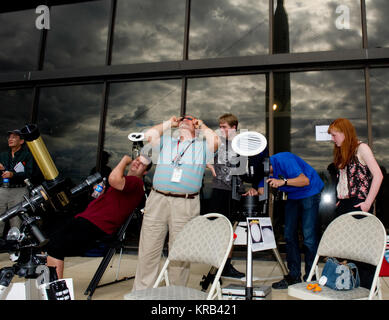 A 'transit of Venus' occurs when the planet Venus passes directly between the sun and the Earth. During the event, Venus will be seen from Earth as a small black sphere moving across the face of the sun.  Such an event won’t occur again until the year 2117.  The Goddard Visitor Center hosted a watch party that included near real-time images from NASA’s Solar Dynamics Observatory mission, coverage of the event from several locations via NASA TV, in-person presentations by NASA experts, hands-on activities for children of all ages. Heavy cloud cover did not allow viewing opportunities of the tra Stock Photo