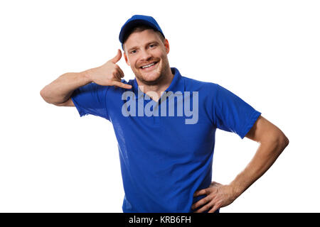 handyman services - worker in blue uniform making phone call gesture Stock Photo