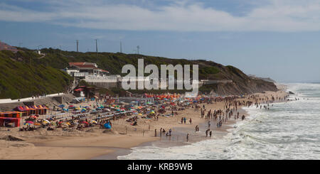 Surf by the beach at São Pedro de Moel near Marinha Grande, Portugal. The Atlantic Ocean laps against the beach. Stock Photo