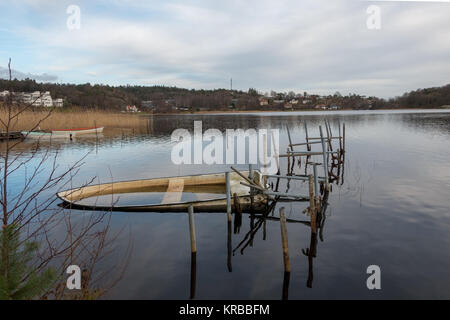 Molndal, Sweden- November 24th 2017: boat at lake stensjon with lots of water in it Stock Photo