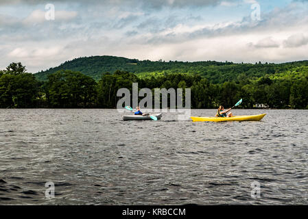 family kayaking on Flying Pond, Mount Vernon, Maine Stock Photo