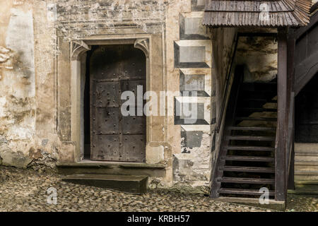 Historic doors with stair in castle yard Stock Photo