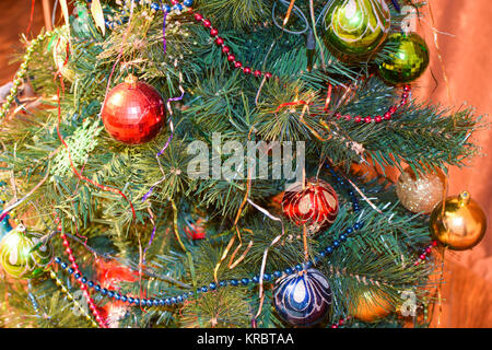 Christmas toys and ornaments on the Christmas tree Stock Photo