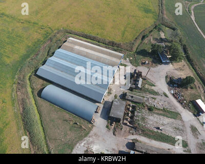 Hangar of galvanized metal sheets for storage of agricultural products Stock Photo