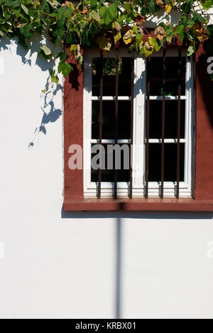 nostalgic window with iron bars Stock Photo