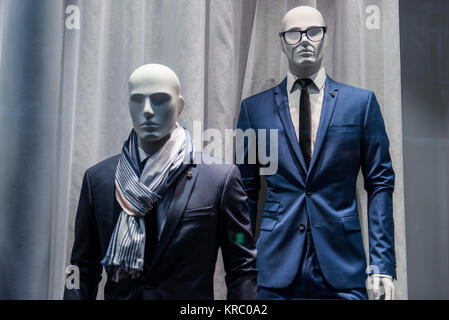 Men suits in a store in Paris. Stock Photo