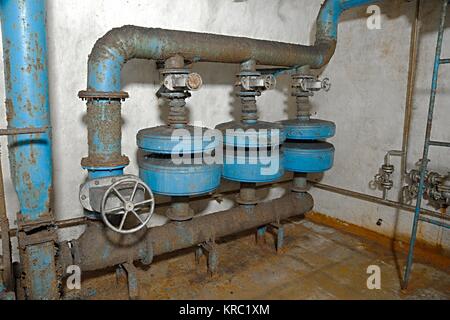 Pipes in an underground bunker Stock Photo