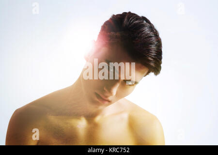 Handsome young man looking at you Stock Photo
