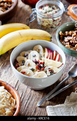 Bowl of yogurt with fruits and cereal for breakfast Stock Photo