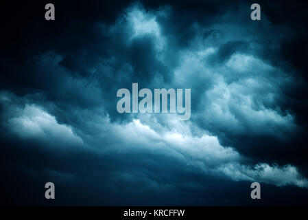Dramatic stormy sky, dark clouds before rain. Weather, climate and meteorology background. Stock Photo
