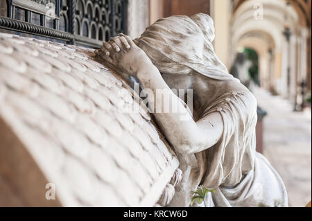 More than 100 years old statue. Cemetery located in North Italy. Stock Photo