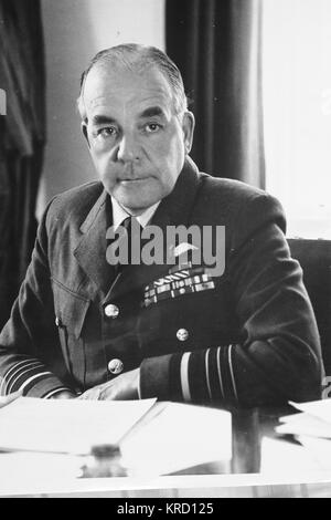 Air Chief Marshal Sir Harry Broadhurst (1905-1995), nicknamed Broady, a senior Royal Air Force commander.  Seen here in uniform, seated at his desk. Stock Photo