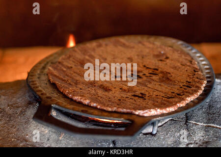 Hot homemade flatbread made of sorghum flour Stock Photo