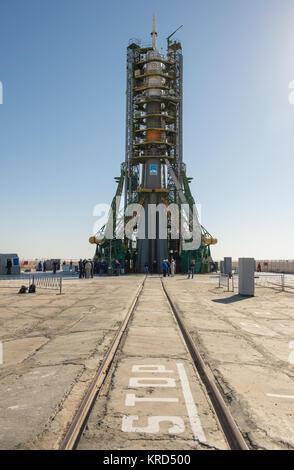 The Soyuz rocket is seen on its launch pad shortly after being lifted into its upright position on Monday, Sept. 23, 2013, at the Baikonur Cosmodrome in Kazakhstan. Launch of the Soyuz rocket is scheduled for September 26 and will send Expedition 37 Soyuz Commander Oleg Kotov, NASA Flight Engineer Michael Hopkins and Russian Flight Engineer Sergei Ryazansky on a five and a half-month mission aboard the International Space Station.  Photo Credit: (NASA/Carla Cioffi) Soyuz TMA-10M spacecraft at the Baikonur Cosmodrome launch pad (8) Stock Photo