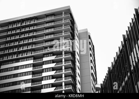 Modern apartment buildings at Rhodes in Sydney, Australia. Apartment blocks in the modern suburb of Rhodes in Sydney, Australia. Black and white photo Stock Photo