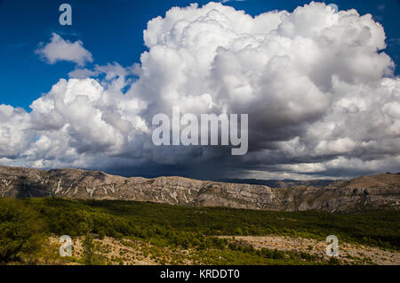 summer mountain landscape with big storm clouds Stock Photo