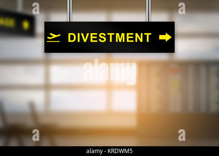 divestment on airport sign board Stock Photo