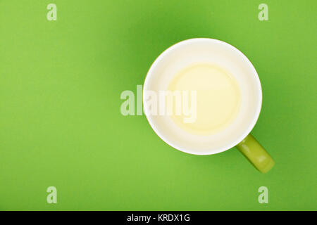 One empty big cup of green oolong tea, saucer Stock Photo