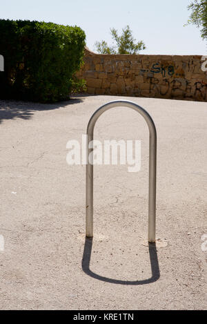 Metal bollard in the shape of an upside down u Stock Photo