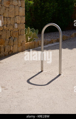 Metal bollard in the shape of an upside down u Stock Photo