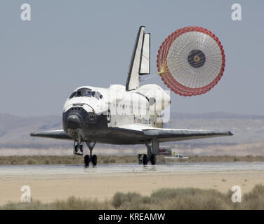 Space Shuttle Atlantis’ drag chute slowed the vehicle on Runway 33 at ...