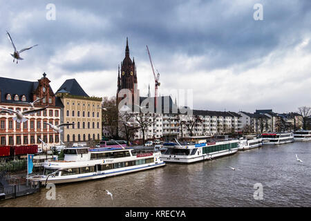 Frankfurt, Germany. River Main view.Bernusbau building, Burnitsbau,spire of Cathedral,apartment buildings,boats Stock Photo